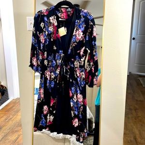 Black sleeveless cotton dress with flower shall